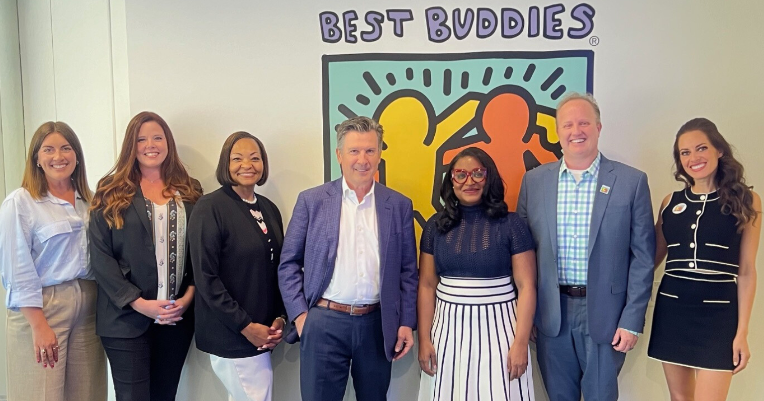 representatives from Eurest/ESFM and Best Buddies gather together at Best Buddies HQ.